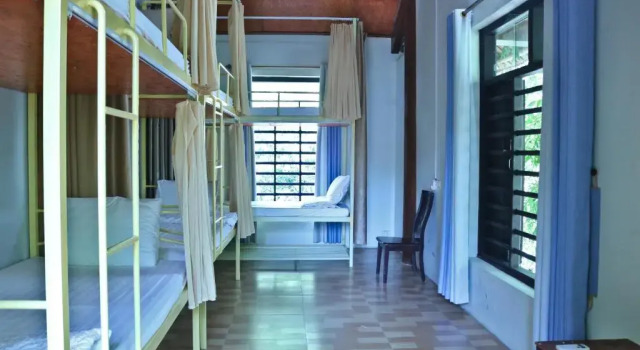 Кровать в общем номере Hang Mua Valley Homestay