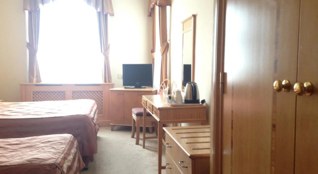 Трёхместный номер Standard Troy Hotel