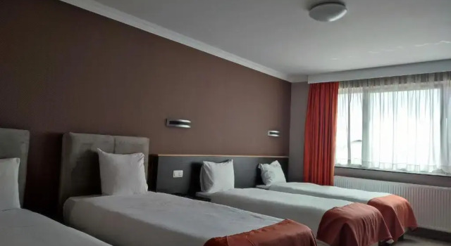 Четырёхместный номер Superior Hotel Taormina Brussels Airport