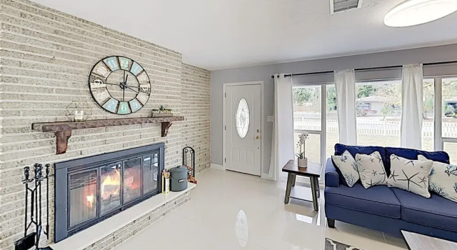 New Listing! Updated W/ Caged Pool & Patio 4 Bedroom Home