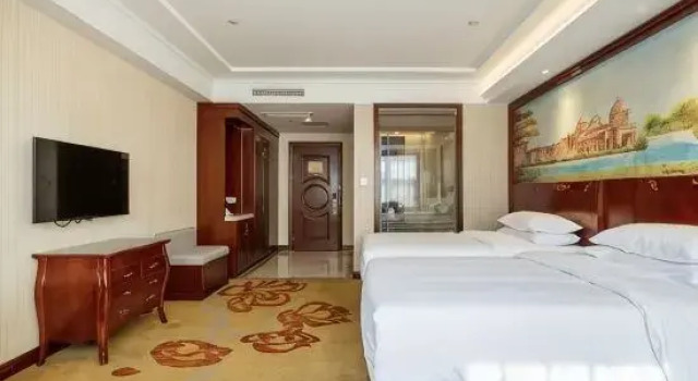 Кровать в общем номере (мужской номер) Vienna Hotel Jiangsu Changzhou Jintan Fenghuangcheng