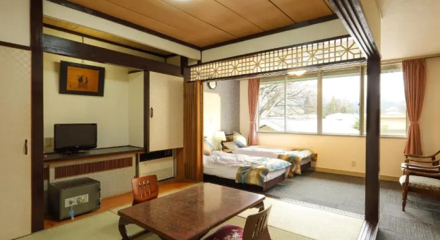 Четырёхместный номер Standard Kurobe Sunvalley Hotel