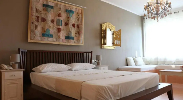 Четырёхместный номер Standard Kelyfos Hotel Bungalows and Suites