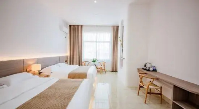 Люкс Comfort Meizhoudao Zhaoxi Chaoxi Homestay (Lianchiao Shatan Beach)