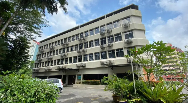 Кровать в общем номере Telang Usan Hotel Kuching