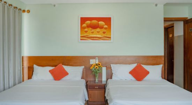 Кровать в общем номере Art Deluxe Hotel