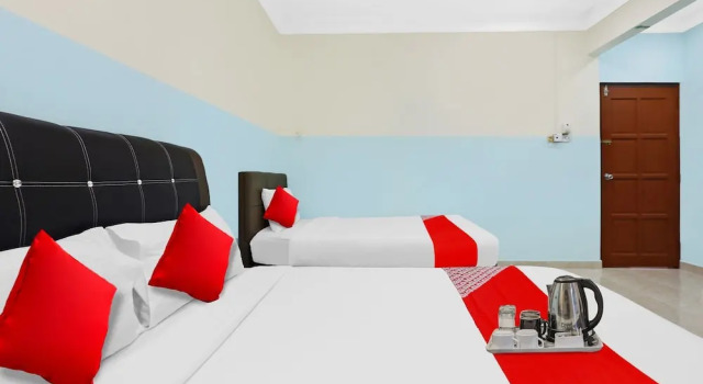 Номер Deluxe OYO 90873 Travellers Inn