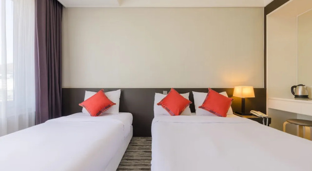 Двухместный семейный номер Standard c 1 комнатой с видом на город Shin Shin Hotel Jeju Worldcup