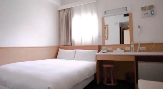 Номер Economy Tien Chin Hotel