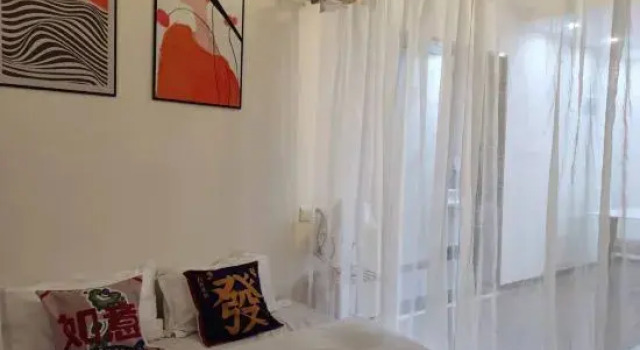 Люкс с видом на закат Xuanxuanli Homestay (Yichang Duhui Junbo Branch)