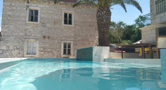 Апартаменты Holiday House with a pool