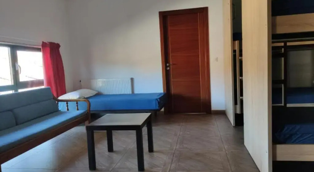 Кровать в общем номере Albergue O Logoso