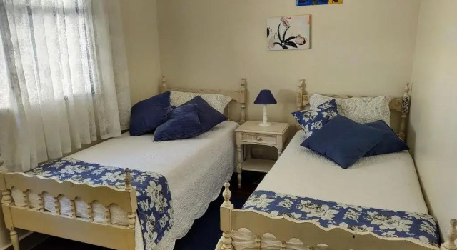 Вилла Tranquilidade a meia quadra da praia - churrasqueira, super wi-fi e Chromecast!