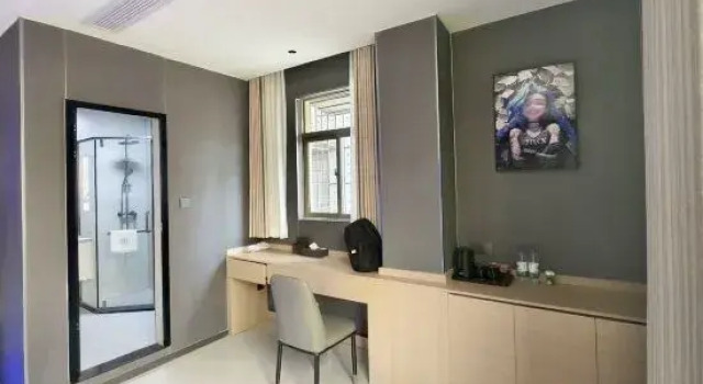 Кровать в общем номере Jiuhouxuan Hotel