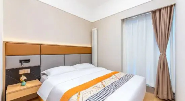 Люкс Business Jie Mu Si Hotel (Zhengzhou East High-Speed Rail Station)