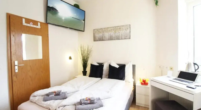 Апартаменты Downtown Apartments Ulm - im Herzen von Ulm & komfortable Boxspringbetten