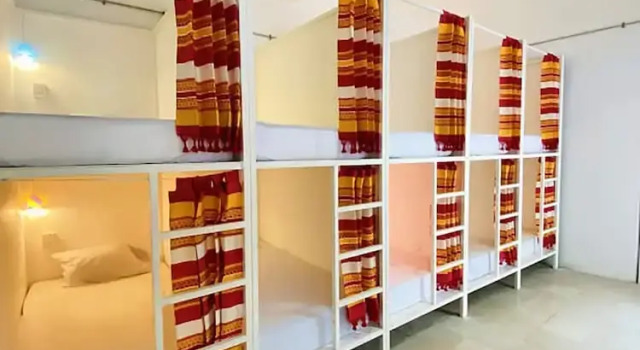 Кровать в общем номере Ticuchi Hostal