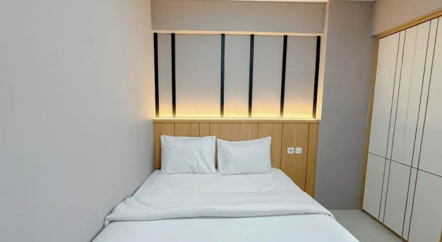 Апартаменты Standard Modern Minimalist 2Br Apartment At Suncity Residence