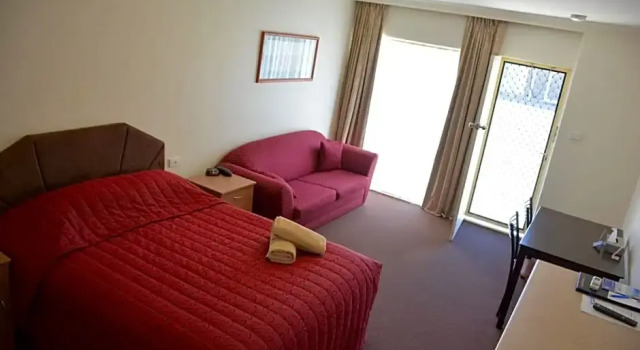 Номер Deluxe Augusta Courtyard Motel