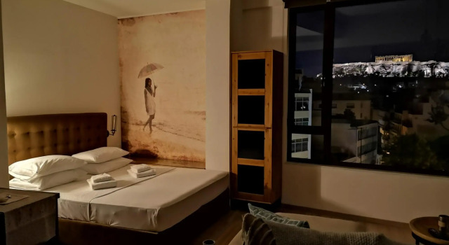 Explore Nightlife Near an Apartment With an Acropolis View