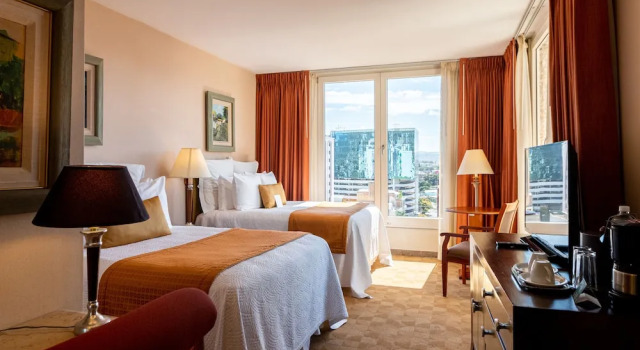 Четырёхместный номер Deluxe Hotel Honduras Maya