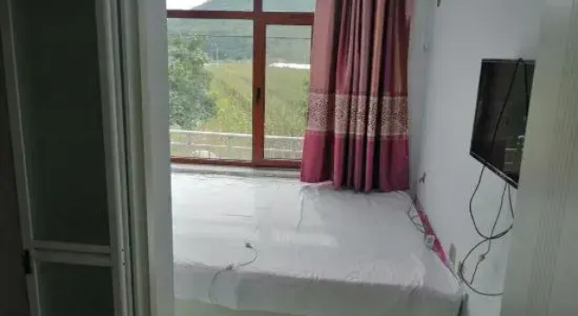 Кровать в общем номере Kuandian Shanye Farmyard