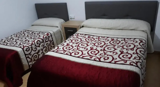 Номер Standard Pension Colón