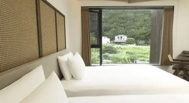 Семейный люкс с 3 комнатами с видом на сад Jingdezhen Baolaixi Resort Hotel (Sanbao International Ceramic Art Village Store)