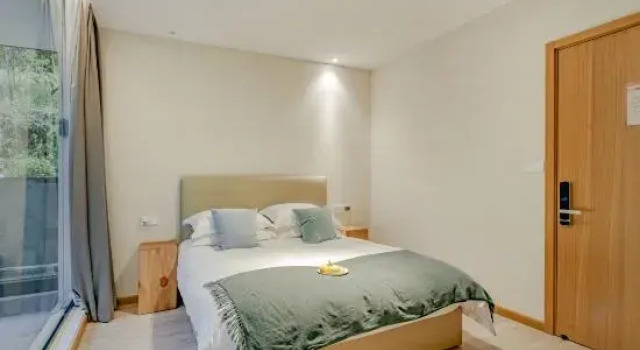 Кровать в общем номере Ningbo No. 29 Guesthouse