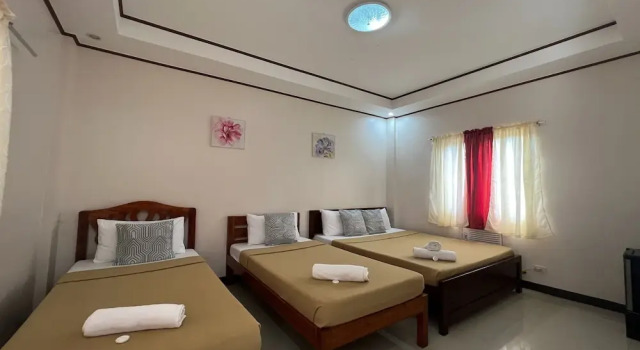 Четырёхместный номер Standard Dinahs Tourist Inn Puerto Princesa