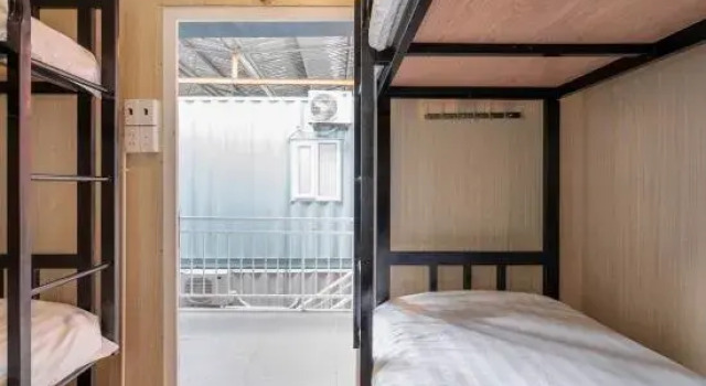 Кровать в общем номере Nin Garden Homestay