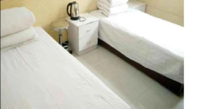 Gold Shield Inn, Rezervovat Hotel Xi Gong 