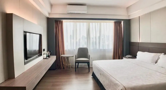 Номер Deluxe Jinguan Holiday Hotel