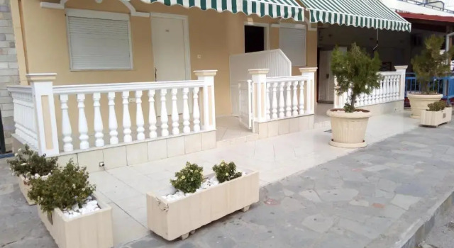 Standardowy czteroosobowy pokój Hotel Exarhos
