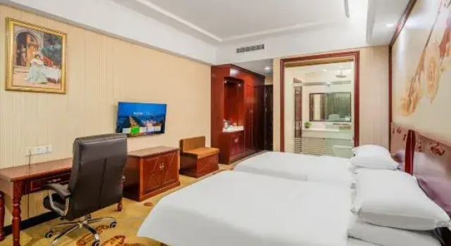 Кровать в общем номере (мужской номер) Vienna Hotel Jiangsu Changzhou Jintan Fenghuangcheng