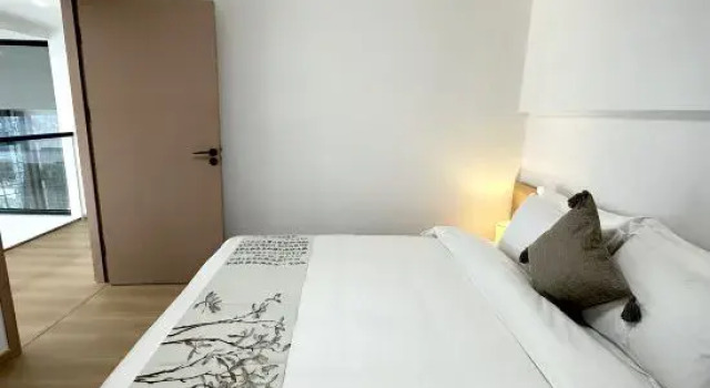 Люкс Xitang Fushi Taofang Scenic Apartment (Liangan Jinrong Zhongxin)