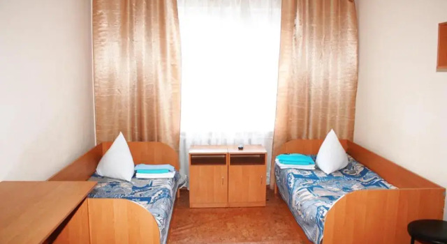 Postel ve společném pokoji Vydubychi