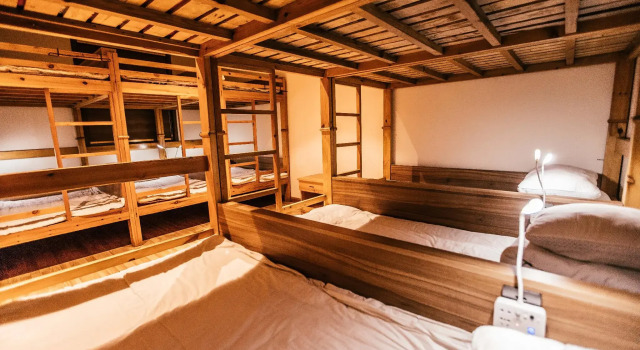 Кровать в общем номере Qufu International Youth Hostel
