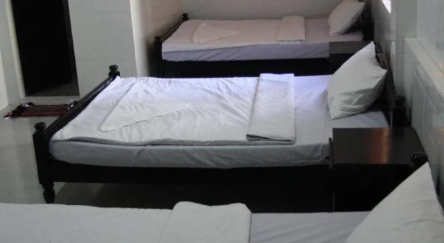 11 Happy Backpackers, Buchen Sie Hotel Daun Penh 
