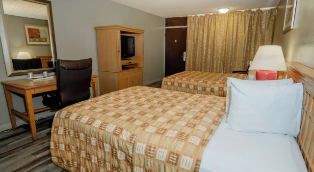 Четырёхместный номер Standard GT Hotels Inn & Suites Extended Stay