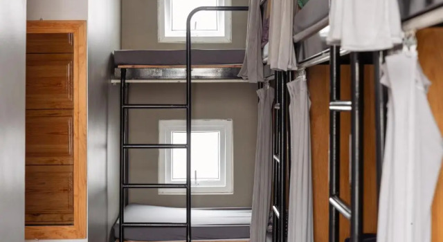 Кровать в общем номере Pi Boutique Hotel