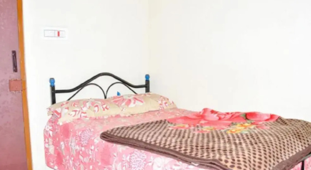 Кровать в общем номере Evergreen homestay by StayApart, Coorg