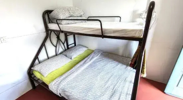 Кровать в общем номере Hotel O Eleven Inn