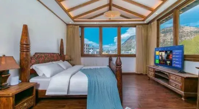 Люкс с красивым видом из окна Kunweidi·Zhongshengguan Chinese Studies B&B (Lijiang Old Town Dashuiche Branch)