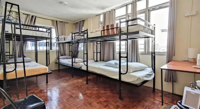Кровать в общем номере Permaisuri Homestay by Evernent
