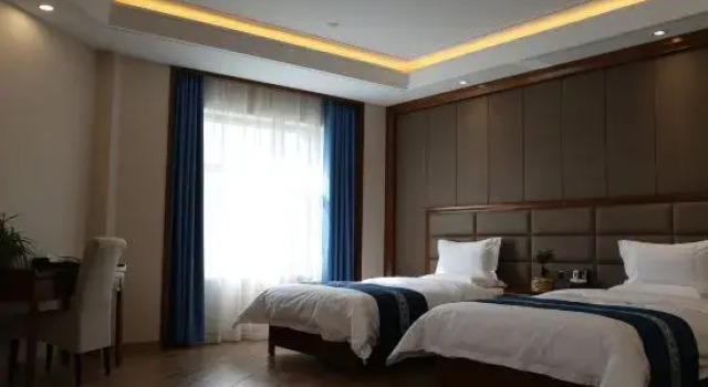 Люкс Deluxe JiuQuanZhiXinHotel