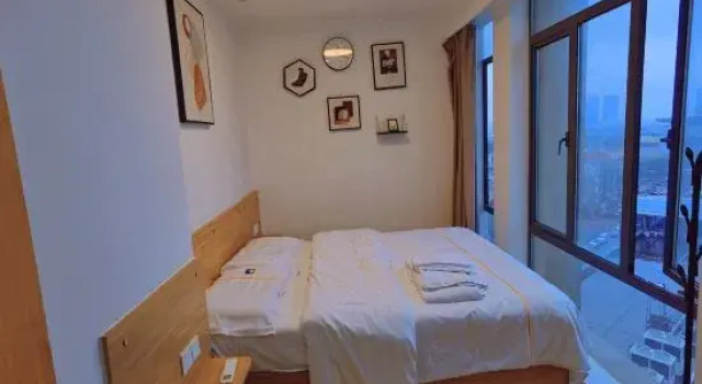 Люкс Chinese Yiju City Apartment (Jiujiang Causeway Bay Branch)