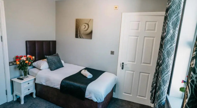 Deluxe Kolmen hengen huone OYO Minerva Guesthouse