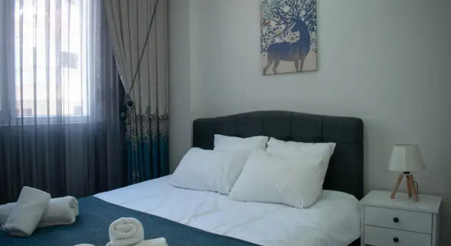 Апартаменты Modern Apartment Near Beach in Muratpasa