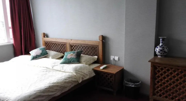 Mama Naxi Guesthouse, Rezerwuj Hotel Lijiang Yunnan
